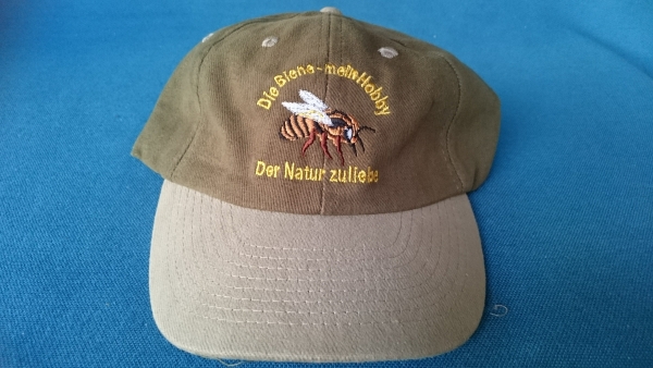Imkermütze grün, beiger Schirm